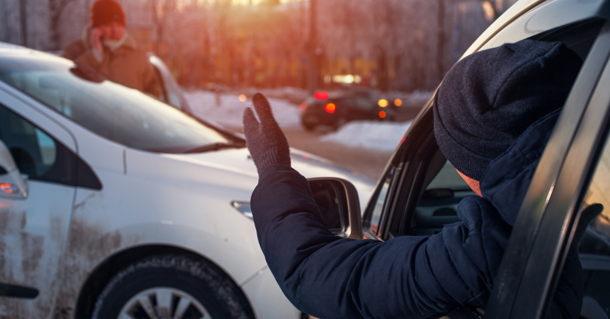 Drivers exchanging information after an auto accident