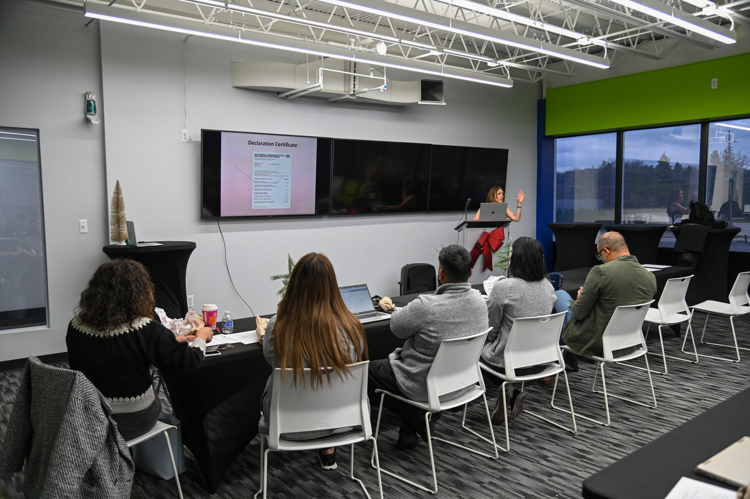 Ascendant Health team presenting to a group